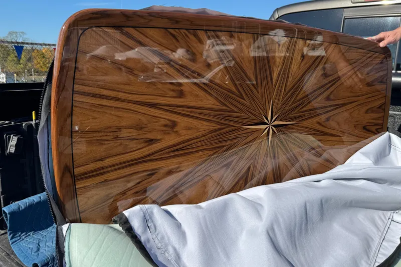 Slide: The Image of Open storage compartments on a 1991 Viking 53 Convertible boat. - 78