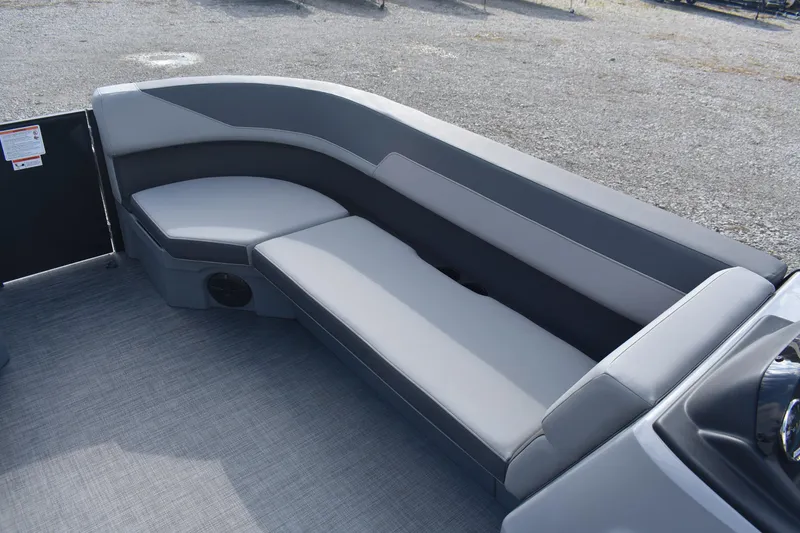 Slide: The Image of 2026 Lowe LS 210 boat interior with sleek gray seating and modern design. - 10