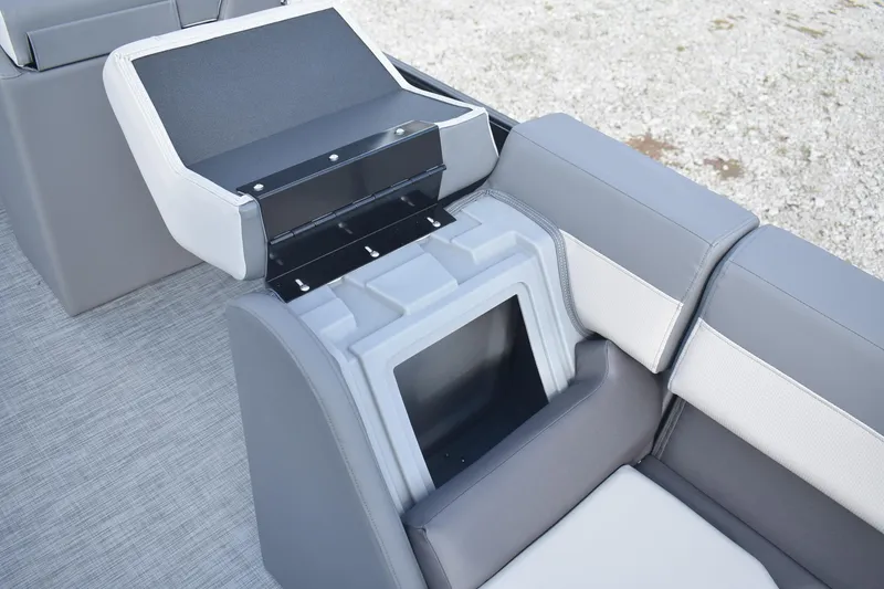 Slide: The Image of Lowe LS 210 (2026) boat seat with storage compartment, featuring gray and white upholstery. - 14