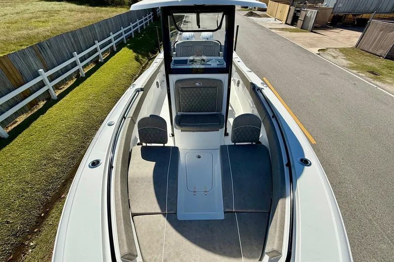 Slide: The Image of 2026 Sea Hunt Ultra 265 SE boat with spacious seating and sleek design. - 16