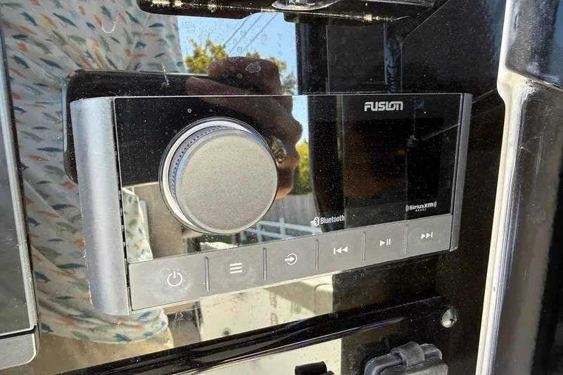 Slide: The Image of Fusion audio system on 2026 Sea Hunt Ultra 265 SE boat dashboard. - 18