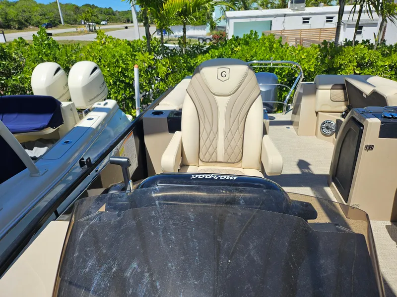 Slide: The Image of Luxury seating on 2020 Godfrey Sanpan 2400 SBC pontoon boat, featuring elegant design and comfort. - 19