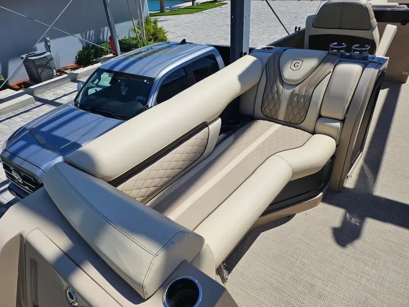 Slide: The Image of Luxurious seating on 2020 Godfrey Sanpan 2400 SBC pontoon boat, featuring elegant design and comfort. - 23