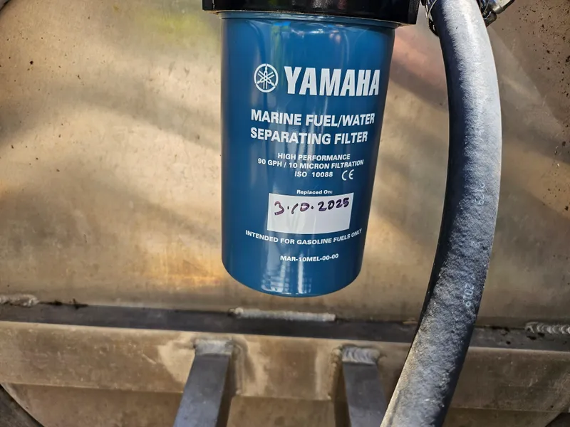Slide: The Image of Yamaha marine fuel/water separating filter on 2020 Godfrey Sanpan 2400 SBC boat. - 27