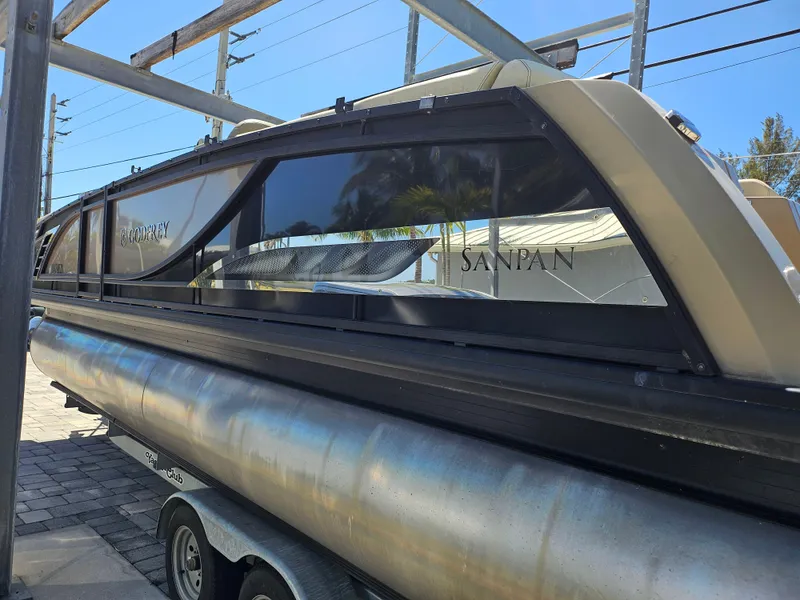 Slide: The Image of 2020 Godfrey Sanpan 2400 SBC pontoon boat on trailer, side view. - 33