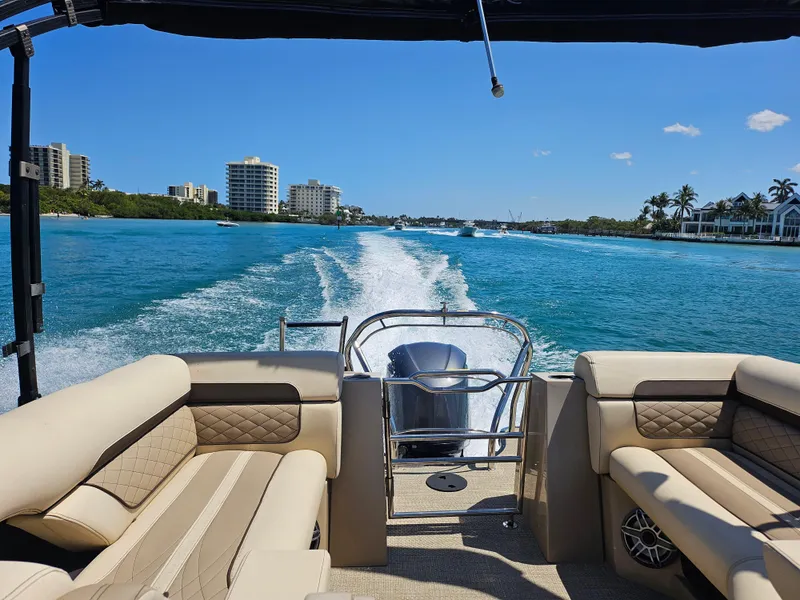 Slide: The Image of Pontoon boat cruising on blue water, Godfrey Sanpan 2400 SBC, 2020 model, sunny day. - 37