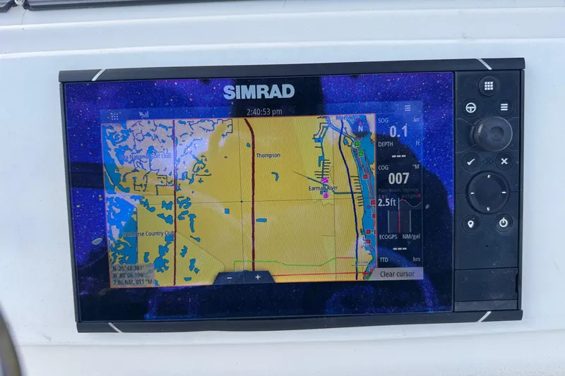 Slide: The Image of Simrad GPS display on 2002 Aquasport 225 Osprey boat, showing navigation map. - 10