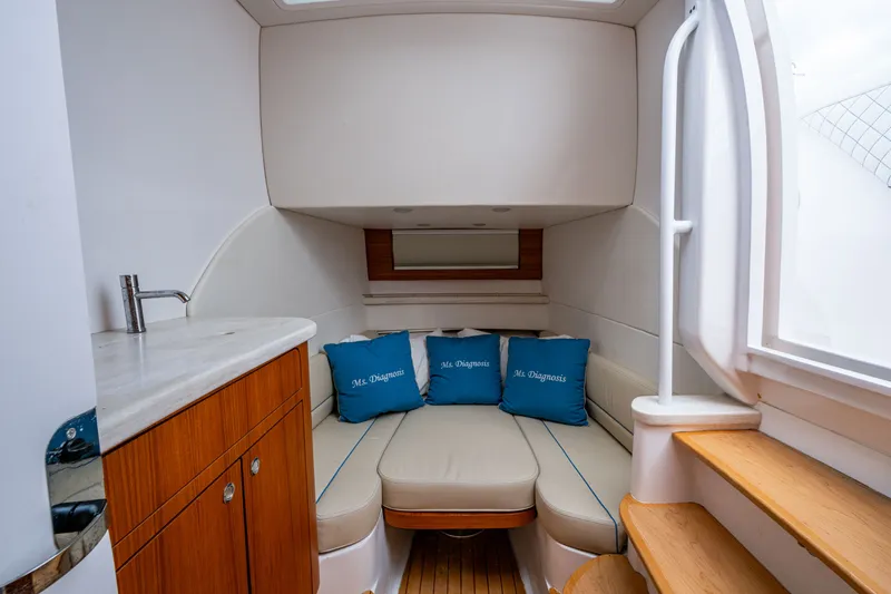 Slide: The Image of Luxurious cabin interior of 2020 Intrepid 407 Panacea with cozy seating and cushions. - 26