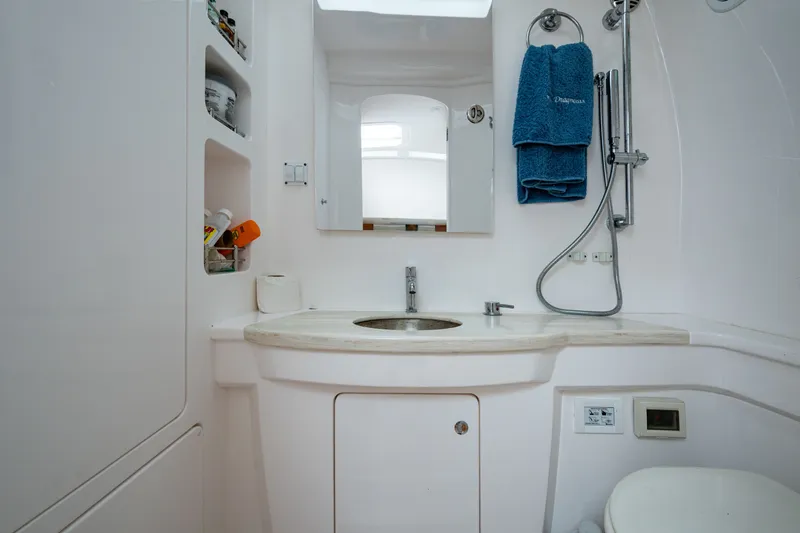 Slide: The Image of Luxurious bathroom in 2020 Intrepid 407 Panacea yacht with modern fixtures and storage. - 33