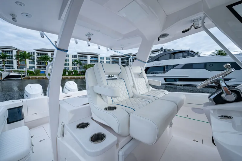 Slide: The Image of Luxurious 2020 Intrepid 407 Panacea boat interior with plush seating and modern design. - 6