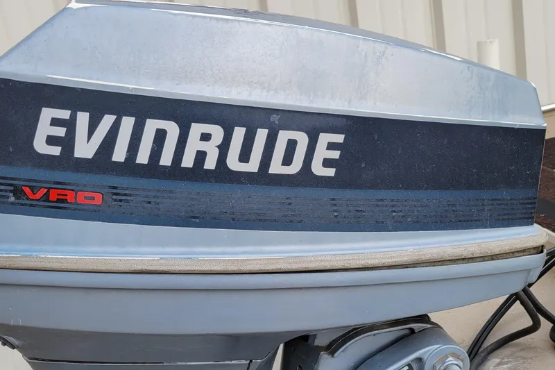 Slide: The Image of Evinrude VRO outboard motor on 1987 Alumacraft Classic 165 CS boat. - 9