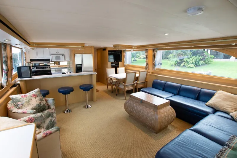 Slide: The Image of Spacious interior of a 1991 Donzi 65 Sportfisherman yacht with modern furnishings. - 12
