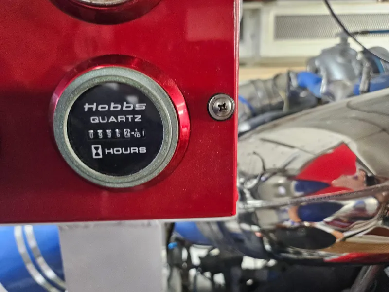 Slide: The Image of Hobbs Quartz hour meter on a 1991 Donzi 65 Sportfisherman boat engine. - 15