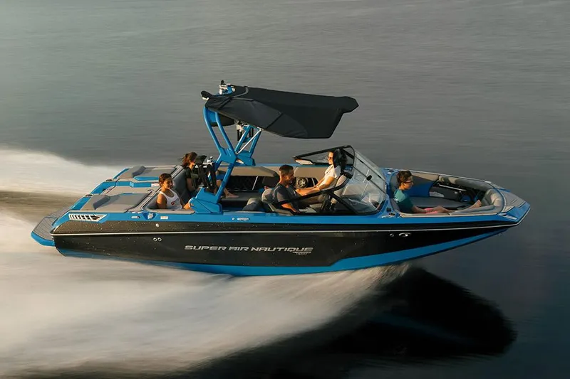Slide: The Image of Manufacturer Provided Image: 2021 Nautique Super Air Nautique GS22 speeding on water with passengers. - 14