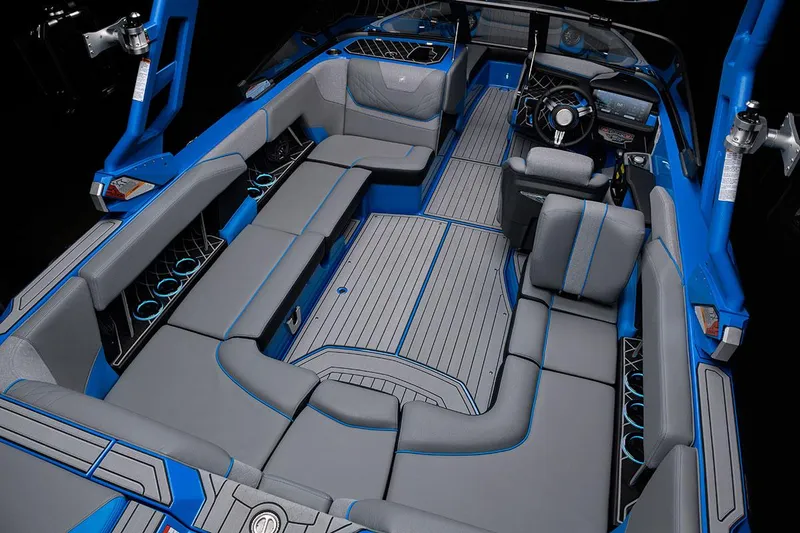 Slide: The Image of Manufacturer Provided Image: 2021 Nautique Super Air Nautique GS22 interior, blue and gray seating, modern design. - 22