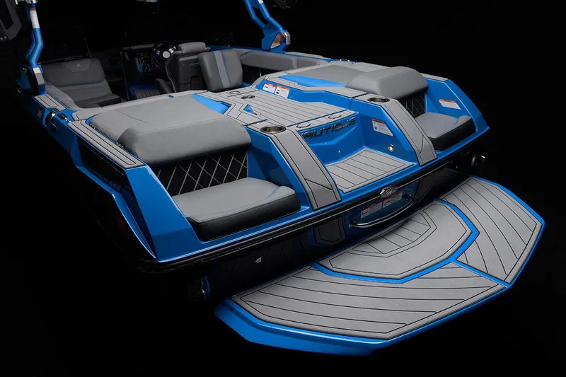 Slide: The Image of Manufacturer Provided Image: 2021 Nautique Super Air Nautique GS22 boat interior, blue and gray seating, rear view. - 24