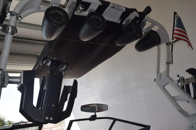Slide: The Image of 2021 Nautique Super Air Nautique GS22 boat tower with speakers and American flag. - 26