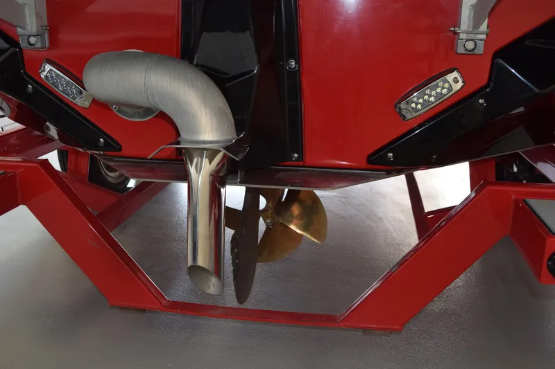 Slide: The Image of 2021 Nautique Super Air Nautique GS22 boat propeller and exhaust detail. - 5