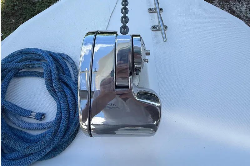 Slide: The Image of Chrome winch and blue rope on 2008 Century 2901 Center Console boat deck. - 15