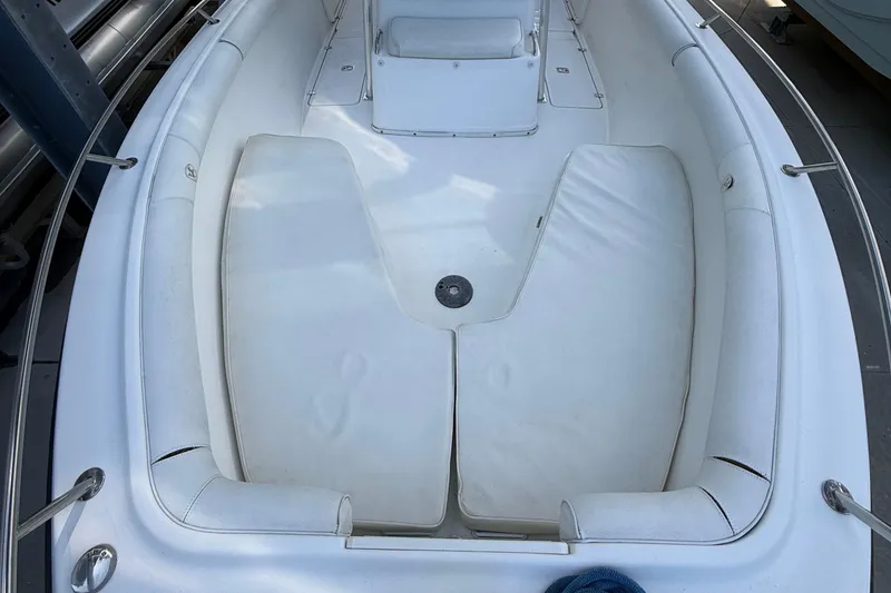 Slide: The Image of 2008 Century 2901 Center Console boat interior with cushioned seating and stainless steel railings. - 16