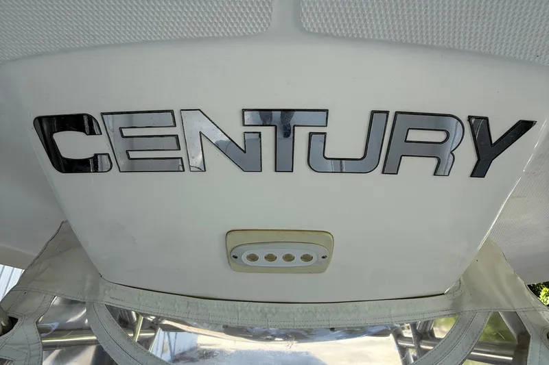 Slide: The Image of Century 2901 Center Console 2008 boat logo on white surface. - 21