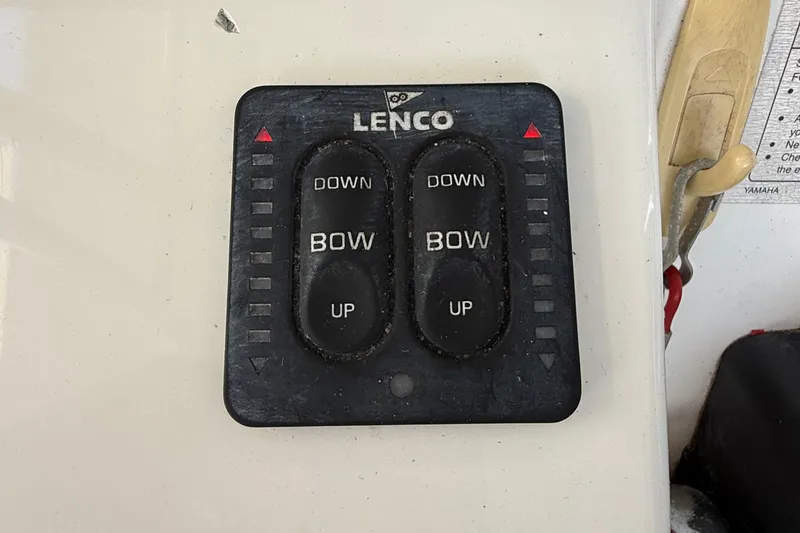 Slide: The Image of Lenco trim tab control panel on 2008 Century 2901 Center Console boat. - 33