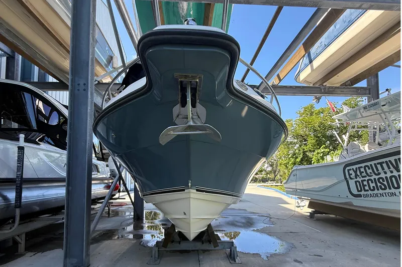 Slide: The Image of 2008 Century 2901 Center Console boat in storage, viewed from the front. - 4