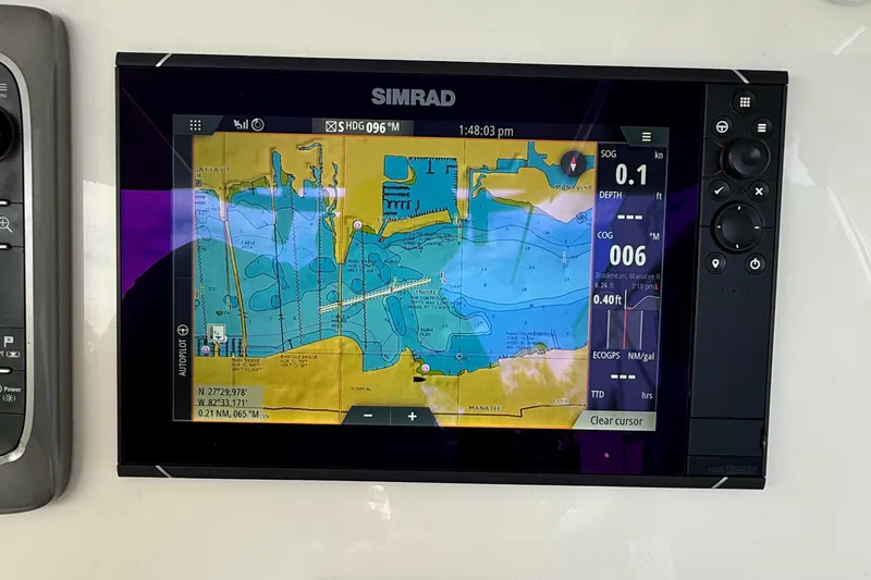 Slide: The Image of Simrad navigation display on a 2008 Century 2901 Center Console boat. - 44