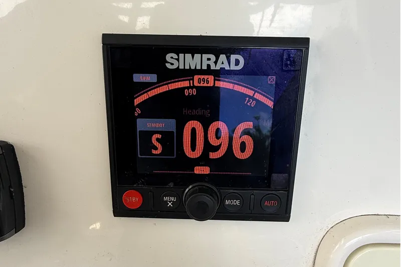 Slide: The Image of Simrad navigation display on 2008 Century 2901 Center Console boat showing heading 096. - 45