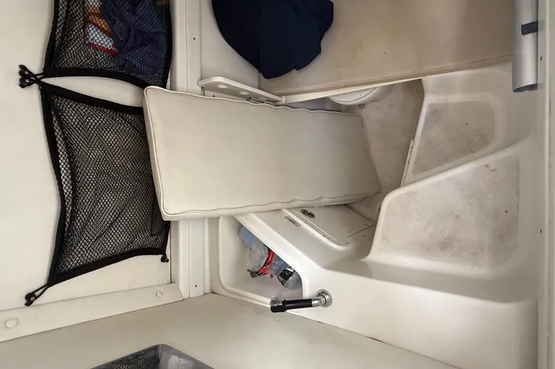 Slide: The Image of 2008 Century 2901 Center Console interior with storage compartments and seating. - 47