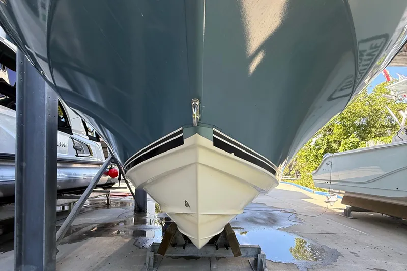 Slide: The Image of 2008 Century 2901 Center Console boat on a trailer, viewed from the front. - 5