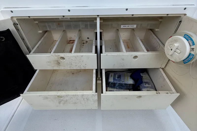 Slide: The Image of Tackle storage drawers on a 2008 Century 2901 Center Console boat. - 60