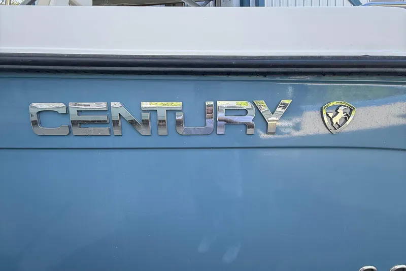 Slide: The Image of Century 2901 Center Console 2008 boat logo on blue background. - 8