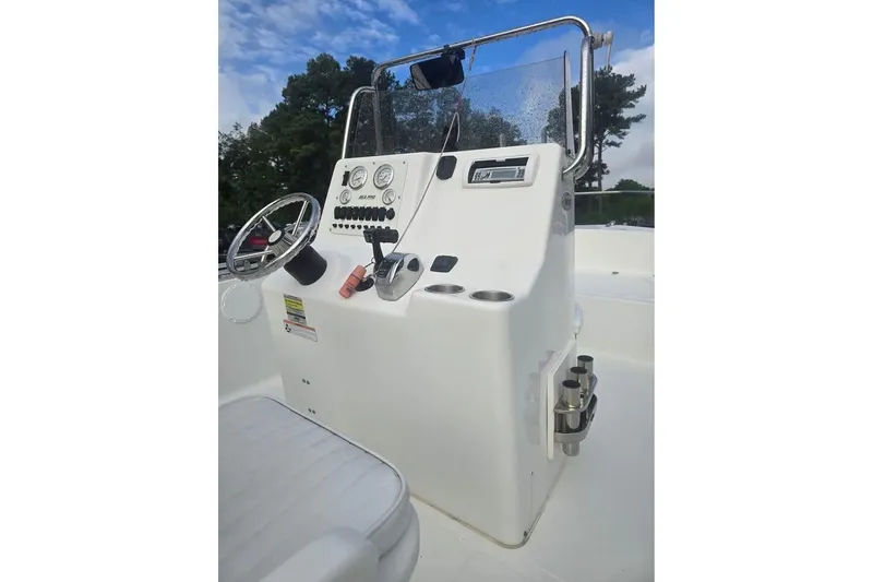 Slide: The Image of 2007 Sea Pro 190 Center Console boat dashboard with steering wheel and controls. - 6