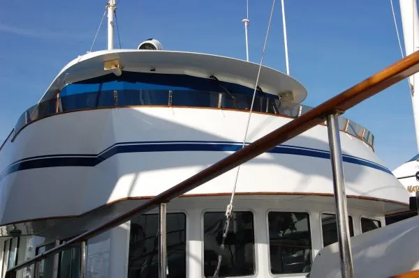 Slide: The Image of 1982 Miller Marine North Sea Trawler, Ed Monk design, featuring sleek lines and blue accents. - 20