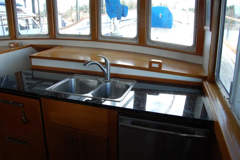 Slide: The Image of Interior of 1982 Miller Marine North Sea Trawler with sink and countertop. - 43