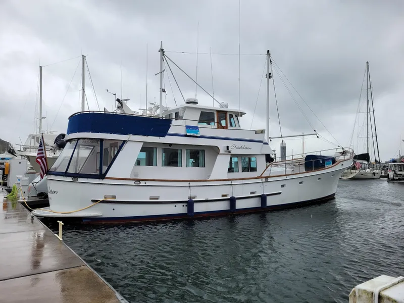 Slide: The Image of 1982 Miller Marine North Sea Trawler Ed Monk docked on a cloudy day. - 6