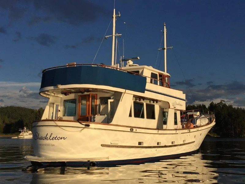 Slide: The Image of 1982 Miller Marine North Sea Trawler Ed Monk on calm water at sunset. - 9