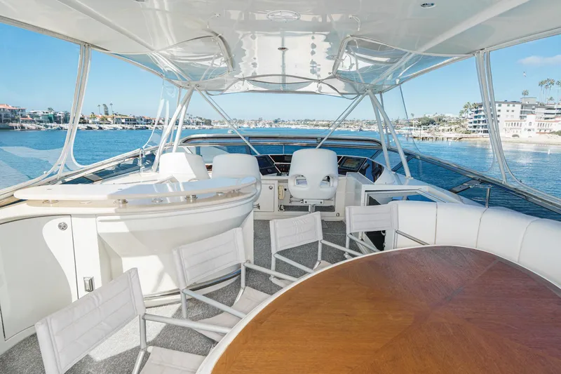 Slide: The Image of Luxurious 2005 Marquis 65 yacht interior with elegant seating and ocean view. - 21