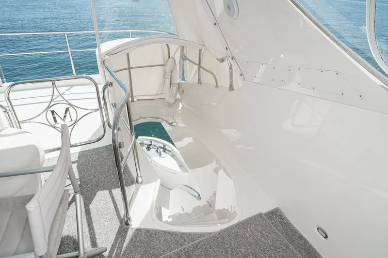 Slide: The Image of Luxurious 2005 Marquis 65 yacht interior with elegant seating and ocean view. - 28