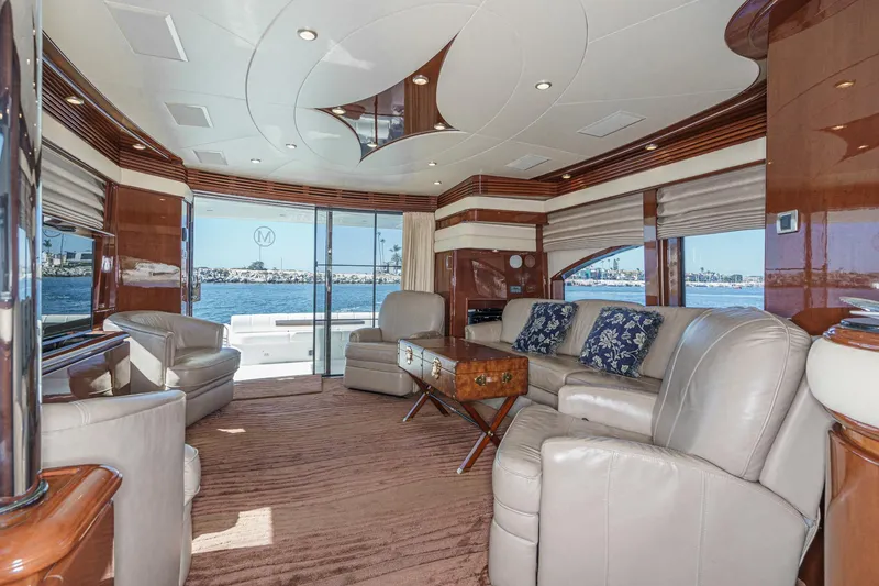 Slide: The Image of Luxurious interior of a 2005 Marquis 65 yacht with elegant seating and ocean view. - 45