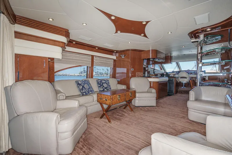 Slide: The Image of Luxurious interior of a 2005 Marquis 65 yacht with elegant seating and modern design. - 46