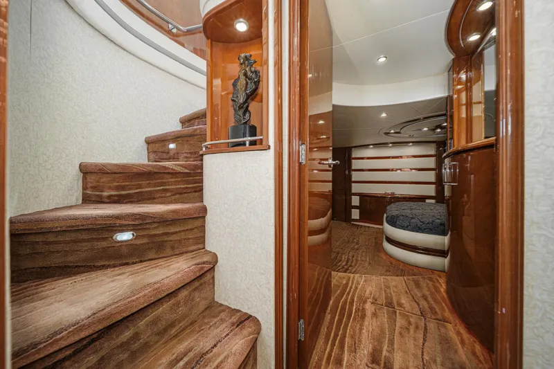 Slide: The Image of Luxurious interior of 2005 Marquis 65 yacht with elegant wood finishes and plush carpeting. - 58