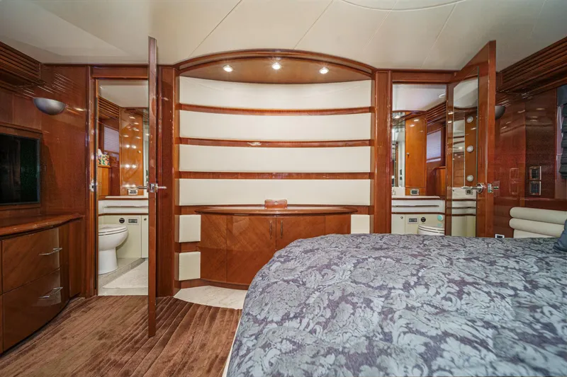 Slide: The Image of Luxurious interior of a 2005 Marquis 65 yacht, featuring elegant wood finishes and modern amenities. - 64