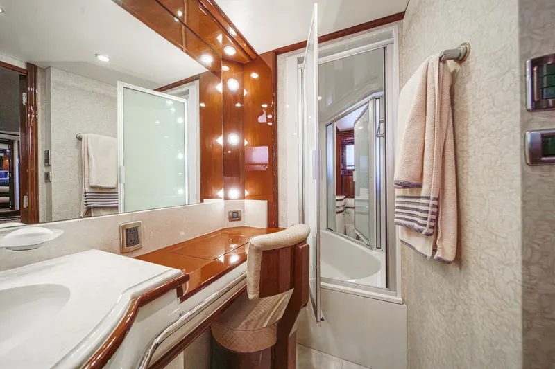 Slide: The Image of Luxurious bathroom interior of 2005 Marquis 65 yacht with elegant wood finishes. - 65