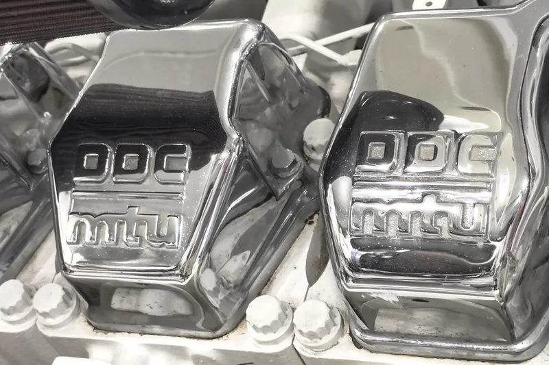 Slide: The Image of Chrome engine parts with "DDC mtu" logo, Marquis 65, 2005 model. - 83