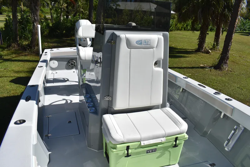 Slide: The Image of 2025 Latitude Tournament Boats 25 interior with storage and speakers. - 20