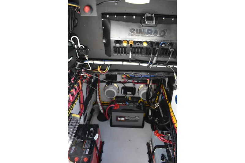 Slide: The Image of 2025 Latitude Tournament Boats 25 electrical system with Simrad equipment and battery setup. - 32