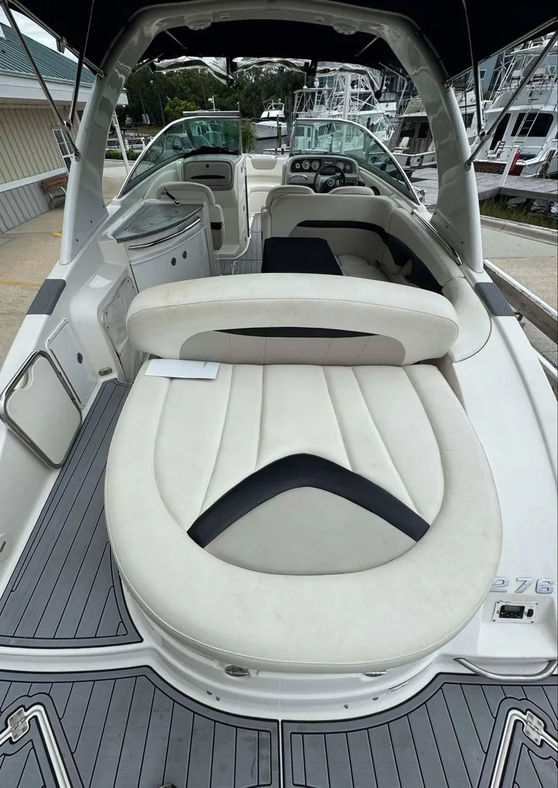 Slide: The Image of 2007 Chaparral SSX 276 boat interior with white seating and sleek design. - 10