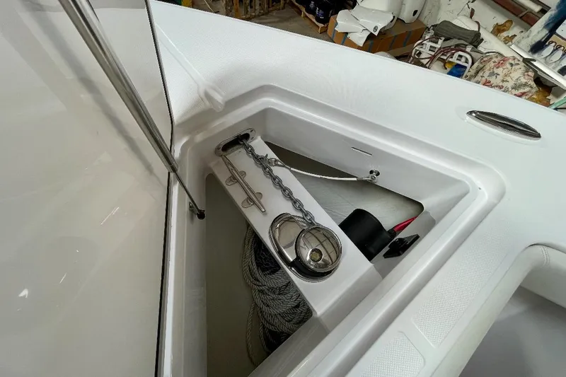 Slide: The Image of Anchor compartment of 2023 Jupiter 32 boat with chain and rope storage. - 16